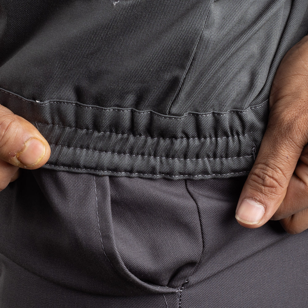Reinforced stitching detail on the KOLDING workwear jacket for enhanced durability and long-lasting performance.