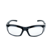 Front view of Mallcom Altair safety goggles featuring a clear wraparound lens, black protective frame, adjustable side temples, and removable eyebrow protector.
