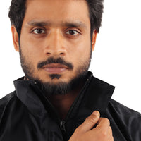 Front zipper closure on the ARCUS olive and black rainwear jacket for secure fastening.