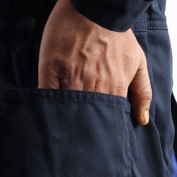 Rear pocket feature of the Floriad workwear coverall showcasing practical storage for tools and personal items.