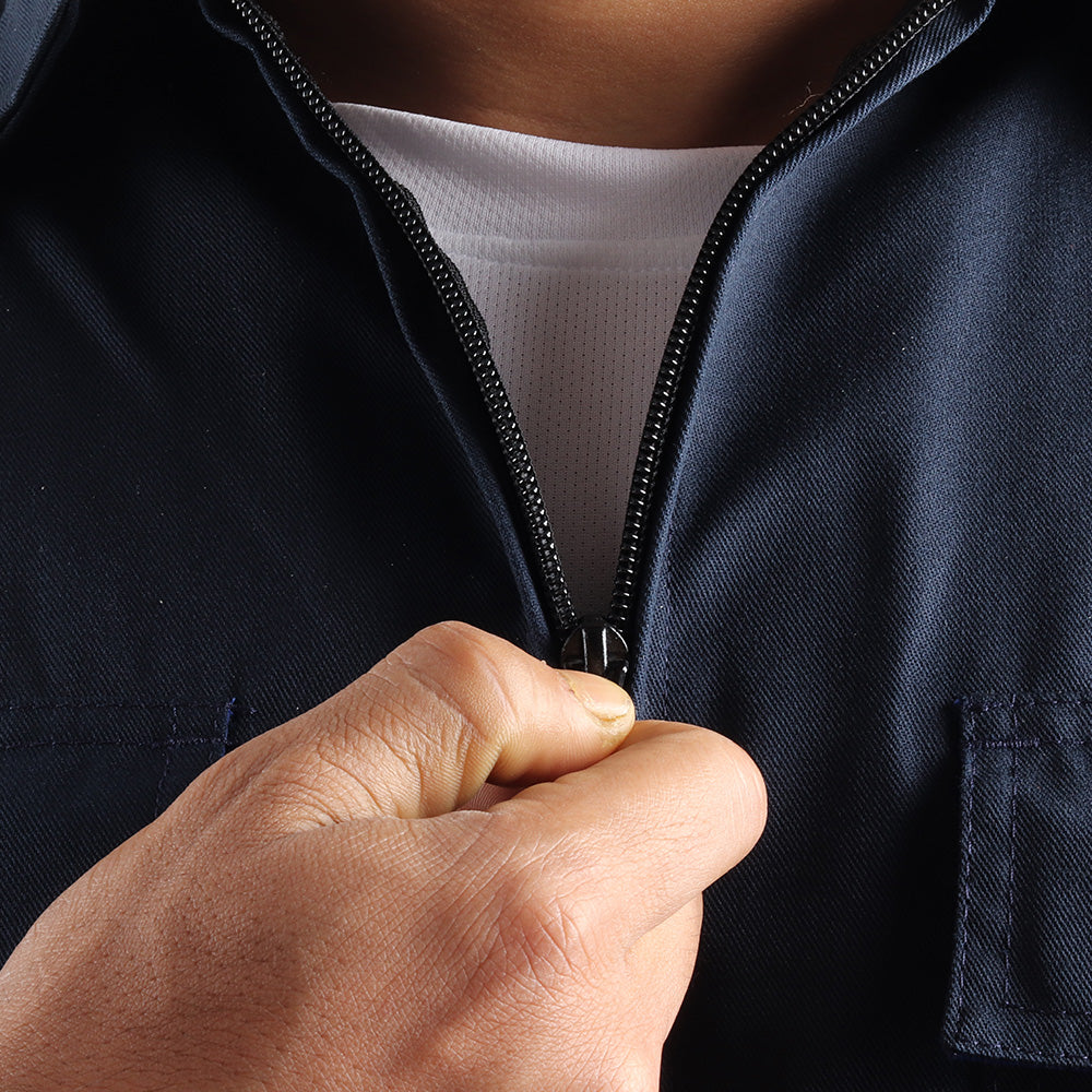 Front zipper detail on the Floriad workwear coverall.