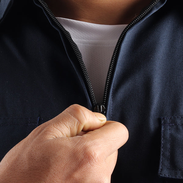 Front zipper detail on the Floriad workwear coverall.