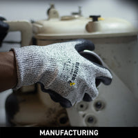 H33NBG safety gloves used in manufacturing operations, providing cut resistance, superior grip, abrasion protection, and reliable hand safety for precision and heavy-duty tasks.