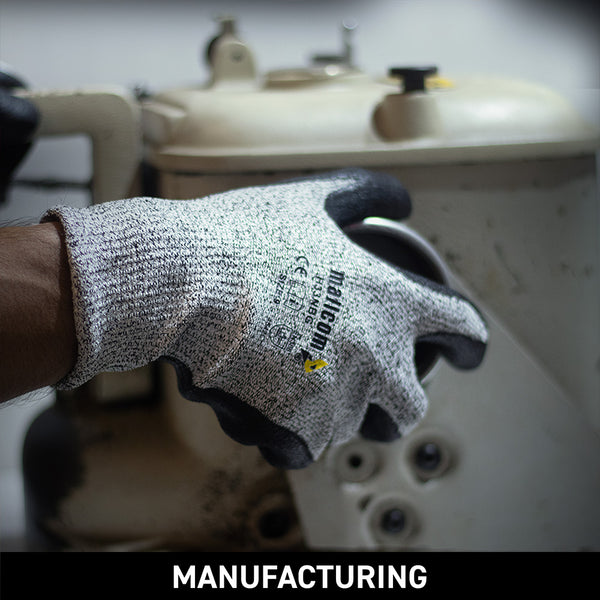 H33NBG safety gloves used in manufacturing operations, providing cut resistance, superior grip, abrasion protection, and reliable hand safety for precision and heavy-duty tasks.