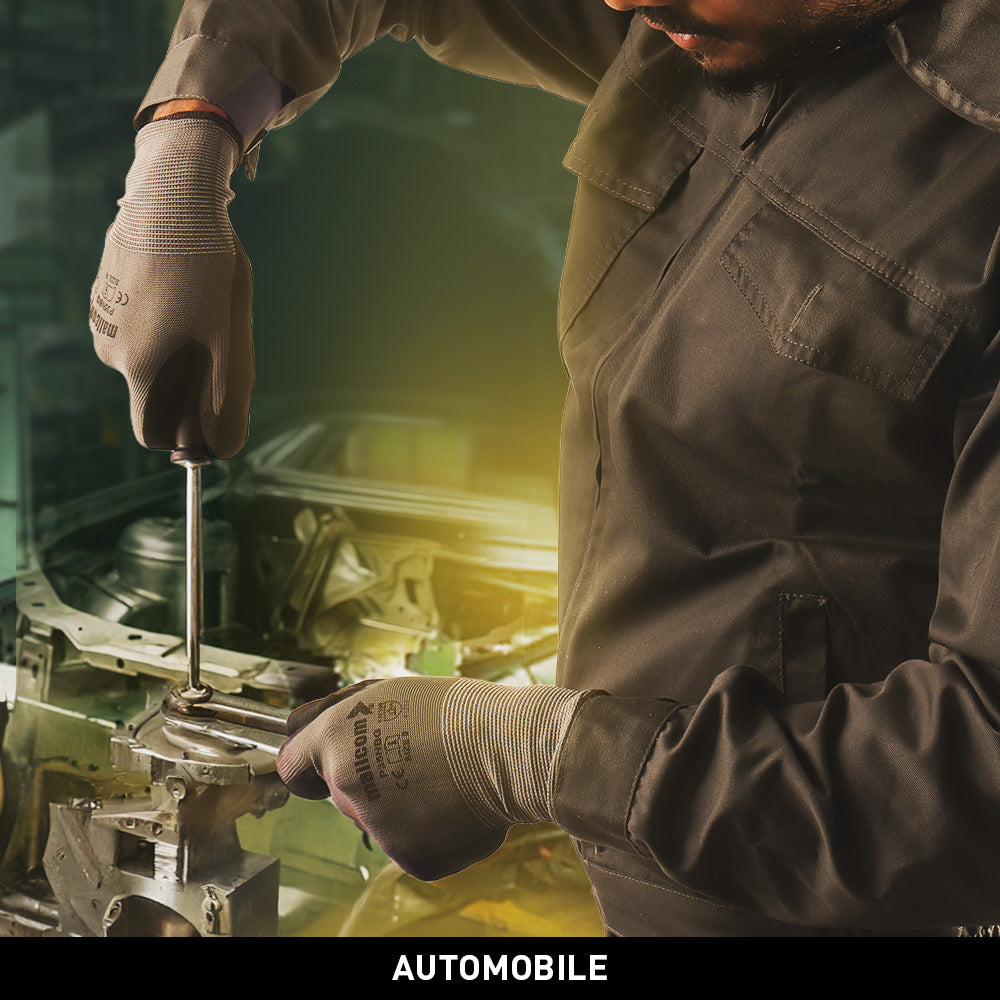 KOLDING & NORD workwear suit used in automobile manufacturing, assembly, and maintenance operations.