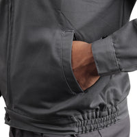 Utility pocket on the KOLDING & NORD workwear suit for convenient storage of tools and work essentials.