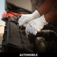 P213W safety gloves used in automobile manufacturing and assembly operations, providing superior grip, flexibility, dexterity, and reliable hand protection.
