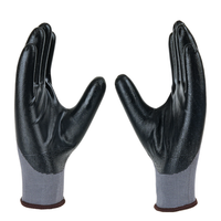 Angled view of P35NBA safety gloves highlighting nitrile coating, flexibility, and secure grip performance.