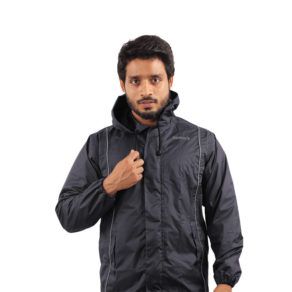 Front view of the black STRATUS rainwear suit featuring a waterproof jacket, utility pockets, and secure front closure.