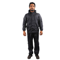 STRATUS rainwear suit with waterproof jacket and pants, reflective detailing, and adjustable hood.