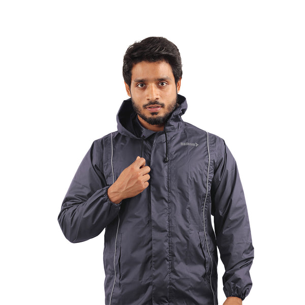 Front view of the navy blue STRATUS rainwear suit featuring a waterproof jacket, utility pockets, and secure front closure.