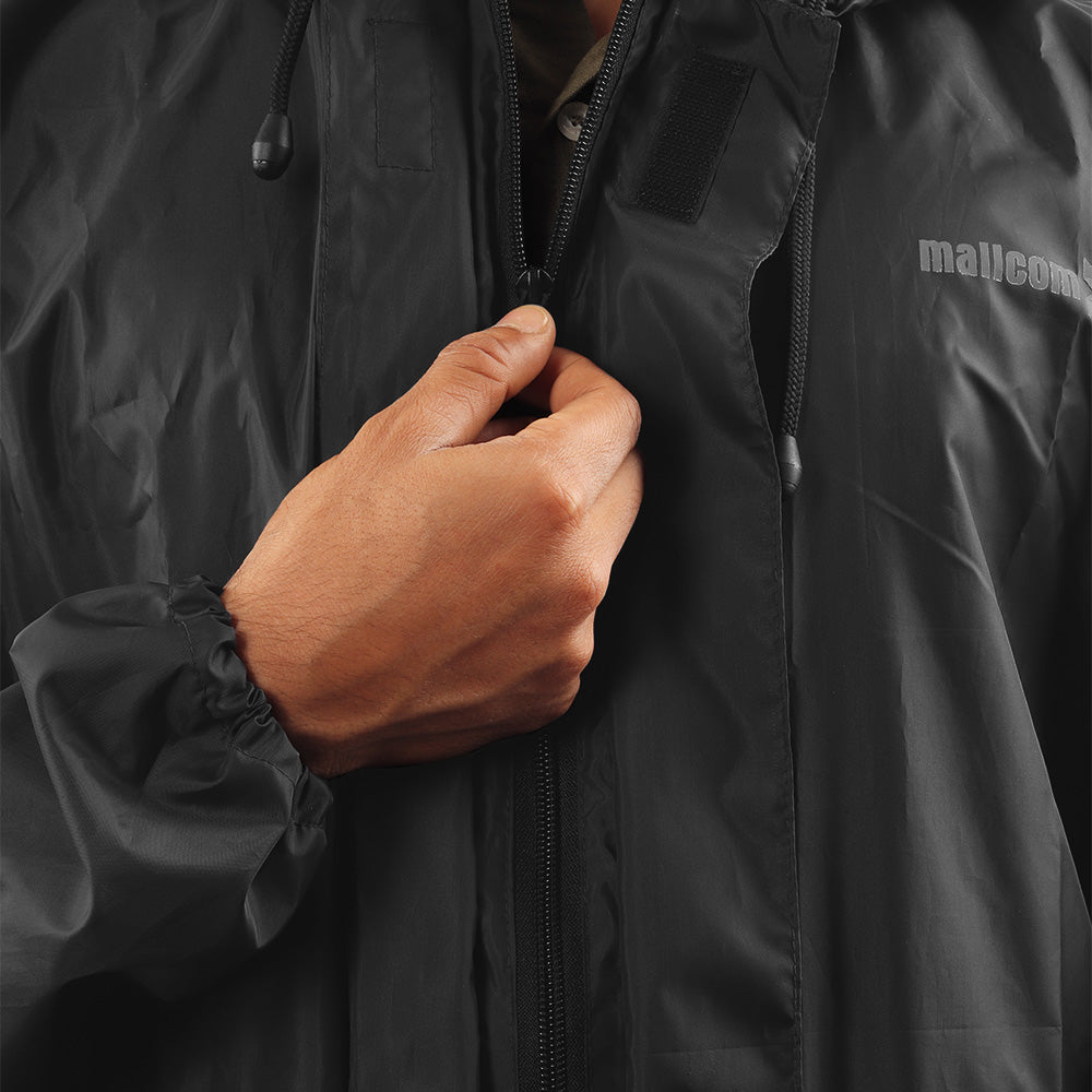 Front zipper closure on the black NIMBUS rainwear jacket for secure fastening and easy wear.