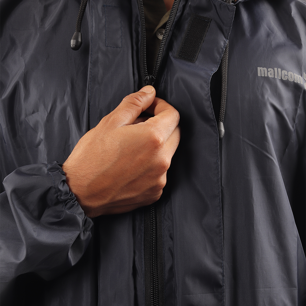 Front zipper closure on the navy blue NIMBUS rainwear jacket for secure fastening and easy wear.