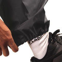 Elasticated ankle cuff on the grey NIMBUS rainwear pants for a secure and comfortable fit.