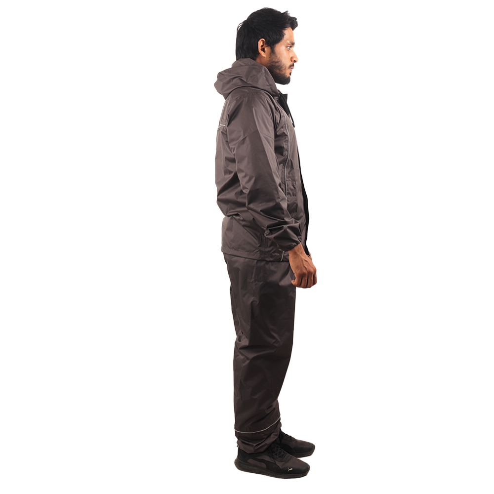 Side view of the grey STRATUS rainwear suit showcasing waterproof construction, reflective detailing, and functional design.