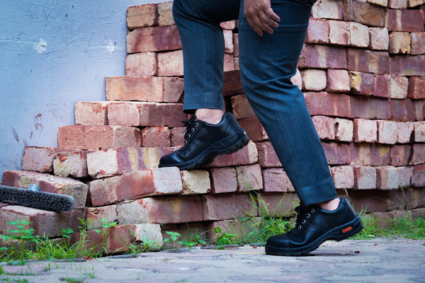 Tiger Lorex S1 safety shoes in workplace and industrial settings.